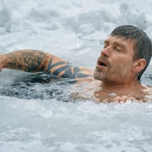 Image of man in ice-cold water.